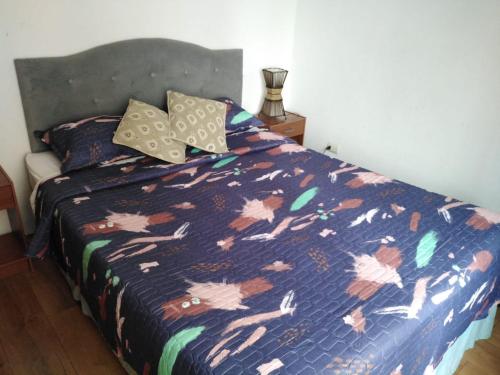 Giường trong phòng chung tại Edificio Altamar Avenida san martin 575