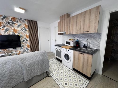 Køkken eller tekøkken på Apartamentos Turísticos Las Claras 1