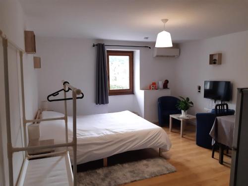 Postel nebo postele na pokoji v ubytování Au relais des ballons