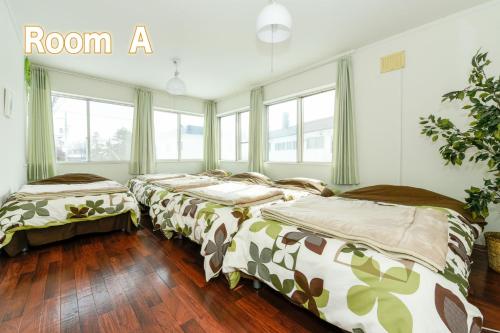 Postel nebo postele na pokoji v ubytování Sapporo - house / Vacation STAY 697