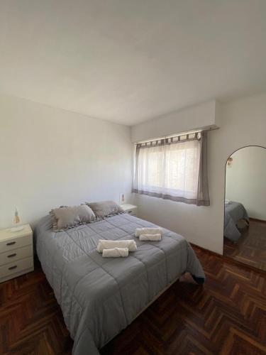 Postel nebo postele na pokoji v ubytování Departamento en Mar del Plata, Zona La Perla