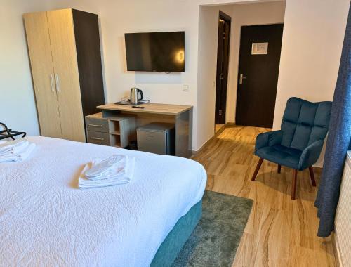 เตียงในห้องที่ Byzanthin rooms