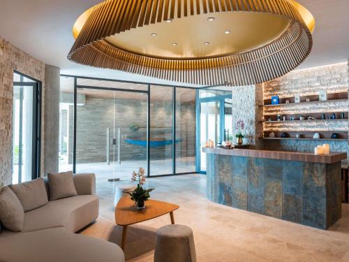 Posezení v ubytování Sofitel Barú Cartagena