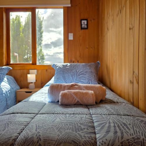 En eller flere senge i et værelse på Acogedora cabaña con una vista increible
