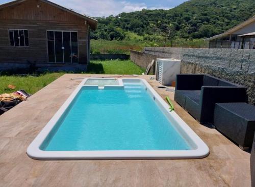 Het zwembad bij of vlak bij Casa Aconchego