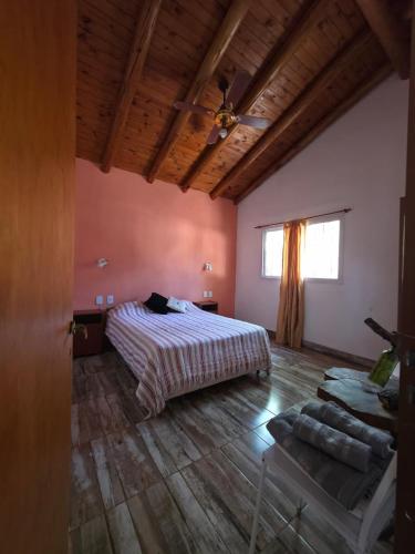 Giường trong phòng chung tại Cabañas Los Cuatro Algarrobos