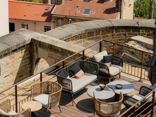 Et opholdsområde på Hôtel Fort St Laurent Lyon - Handwritten Collection