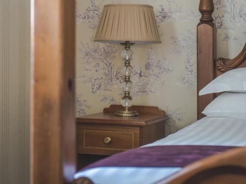 Кровать или кровати в номере Oaklands Hall Hotel Sure Hotel Collection by Best Western