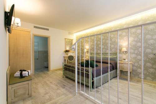 Postel nebo postele na pokoji v ubytování Guest House Dolce Laguna