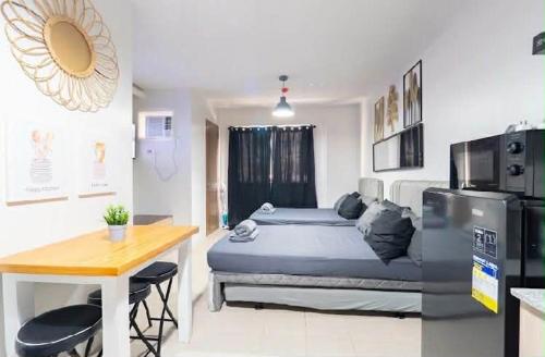 Køkken eller tekøkken på Plumera Condo Near Airport Malls & Schools with Elevator223