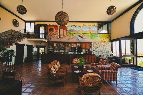 Coin salon dans l'établissement Hacienda Guadalupe Hotel