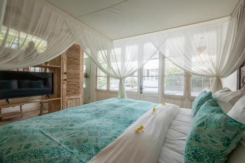 En eller flere senge i et værelse på Villa Bella Seseh, 3-Br With Private Pool