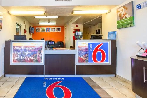 a waiting room at a wiggins clinic at Motel 6 Mesa North in Mesa