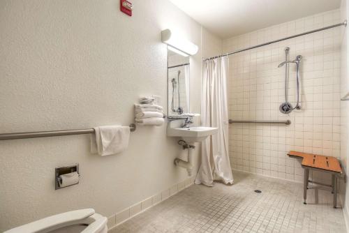 a bathroom with a toilet and a sink at Motel 6-San Diego, CA - North in San Diego