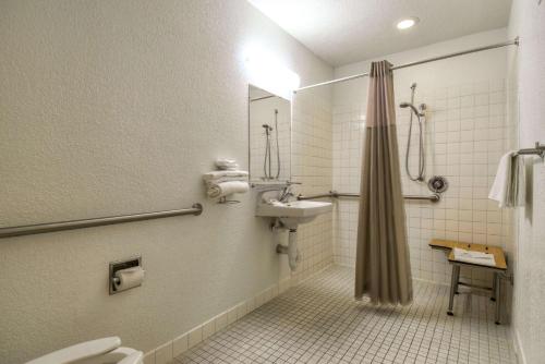 a bathroom with a sink and a toilet and a shower at Motel 6-San Dimas, CA - Los Angeles in San Dimas