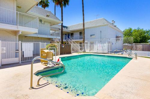 a small swimming pool with a slide in a house at Motel 6-Mesa, AZ - South in Mesa