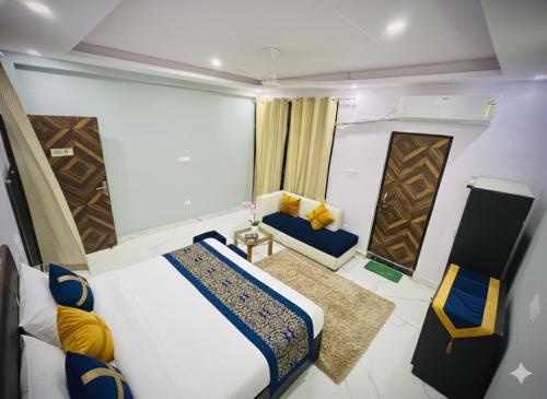 En eller flere senge i et værelse på Hotel regal garden