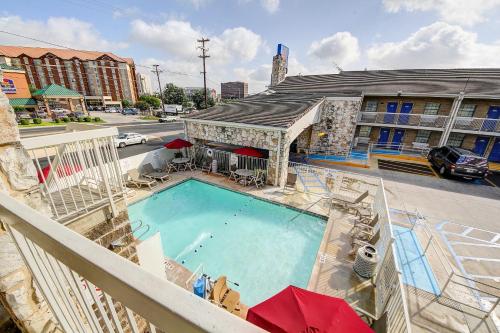 a swimming pool on the balcony of a hotel at Motel 6-San Antonio, TX - Northwest Medical Center in San Antonio