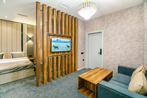 En eller flere senge i et værelse på GREEN PARK HOTEl