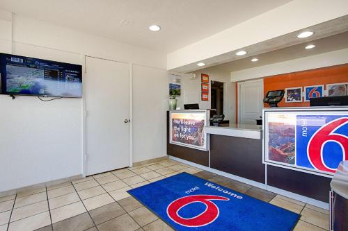 a fast food restaurant with a blue rug on the floor at Motel 6-Tempe, AZ - Scottsdale South in Tempe