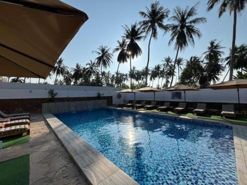 Bazén v ubytování Salalah Social Club nebo v jeho okolí