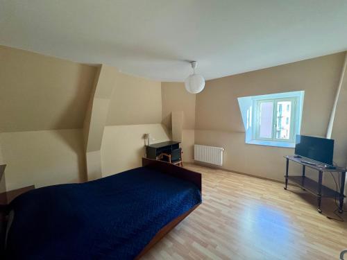 En eller flere senge i et værelse på Les Chambres de Marvejols