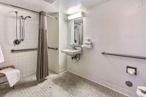 a bathroom with a sink and a shower at Motel 6-Salinas, CA - North Monterey Area in Salinas