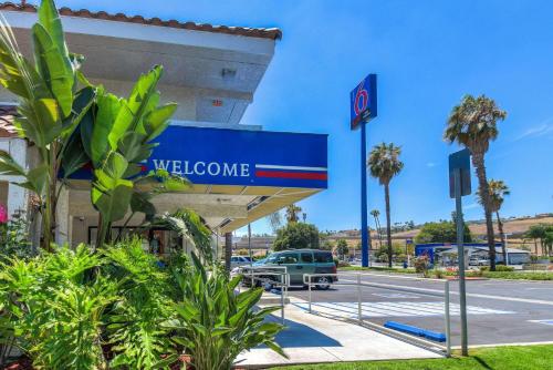a welcome sign at a mobil gas station at Motel 6-Pomona, CA - Los Angeles in Pomona