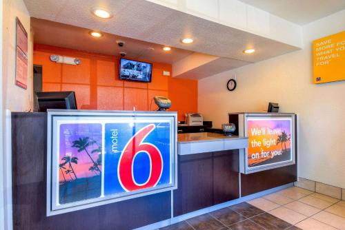 a fast food restaurant with a sign on the counter at Motel 6-Pomona, CA - Los Angeles in Pomona
