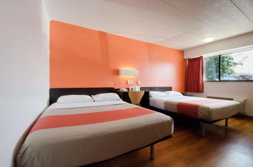 Letto o letti in una camera di Motel 6-Gaithersburg, DC - Washington