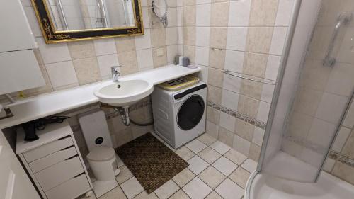 Koupelna v ubytování Ferienhaussiedlung Strandperlen Sanddornhof 2c (Typ II)