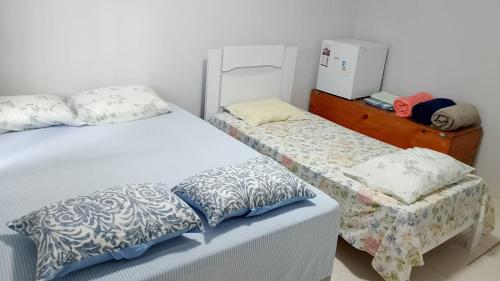 En eller flere senge i et værelse på Casa de Férias- Com 2 quartos, Piscina e Churrasqueira