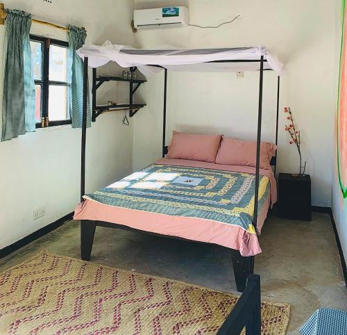 Ein Bett oder Betten in einem Zimmer der Unterkunft Chipatso