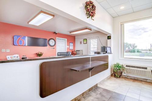 a kitchen with a counter with a sink at Motel 6-Colby, KS in Colby