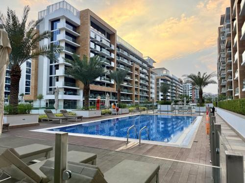Modern 2BR with Balcony in Azizi Riviera 23
