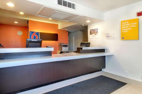 an empty waiting area of a waiting room at a hospital at Motel 6 Capitol Heights, MD - Washington in Capitol Heights