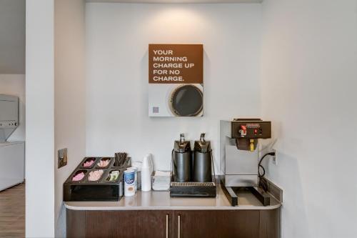 a kitchen with a counter with a coffee maker at Motel 6-Berea, KY in Berea