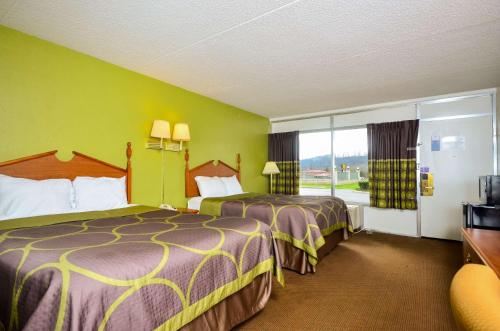 Postel nebo postele na pokoji v ubytování Motel 6-Pulaski, TN