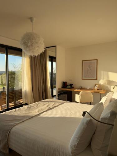 Postel nebo postele na pokoji v ubytování Le Domaine de la Vallée