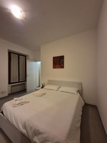 Letto o letti in una camera di La Casetta del 26 B&B