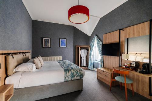 En eller flere senge i et værelse på Craig Manor