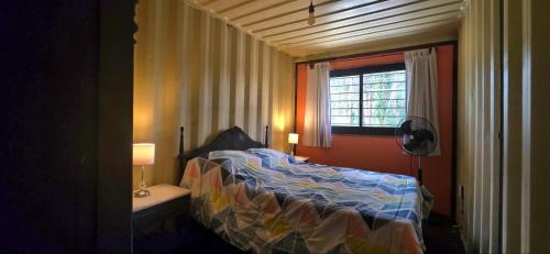 En eller flere senge i et værelse på Bosque & Mar - Fresca cómoda y luminosa.