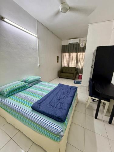 Postel nebo postele na pokoji v ubytování Cozy Home near Airport, & Bayan Lepas Industrial