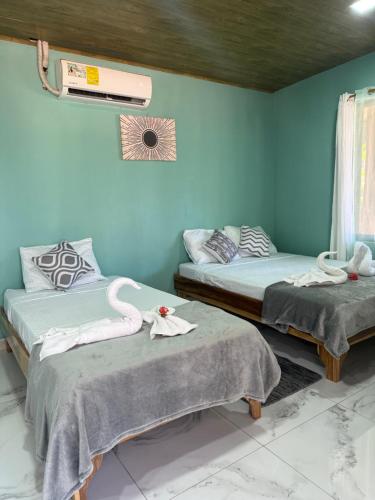 Postel nebo postele na pokoji v ubytování cabina DiTi 2