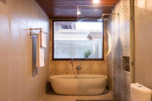 Koupelna v ubytování Akar Villa