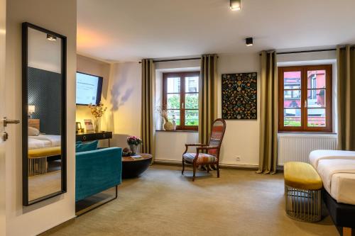 Postel nebo postele na pokoji v ubytování Hôtel le Saint Nicolas