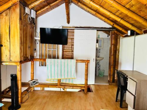 TV a/nebo společenská místnost v ubytování cabaña hotel oasis