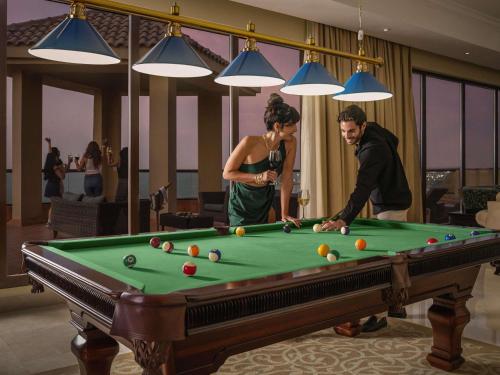 Gæster der bor på Pullman Resort Al Marjan Island