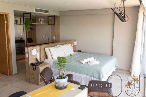 En eller flere senge i et værelse på Paiva Flats By Loui