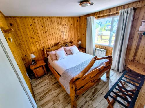 En eller flere senge i et værelse på Complejo "Nahuel Pan "